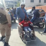 A Member of JKHCA on a wheelchair during a protest at Press Enclave Srinagar